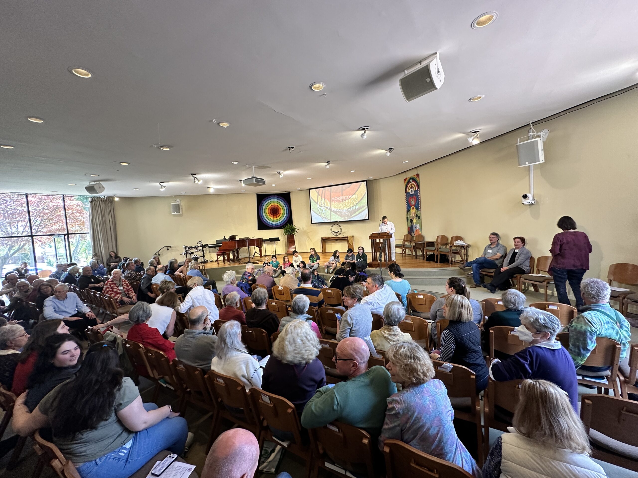 Members of the Fellowship wait for Rev. Sasha after the unanimous vote