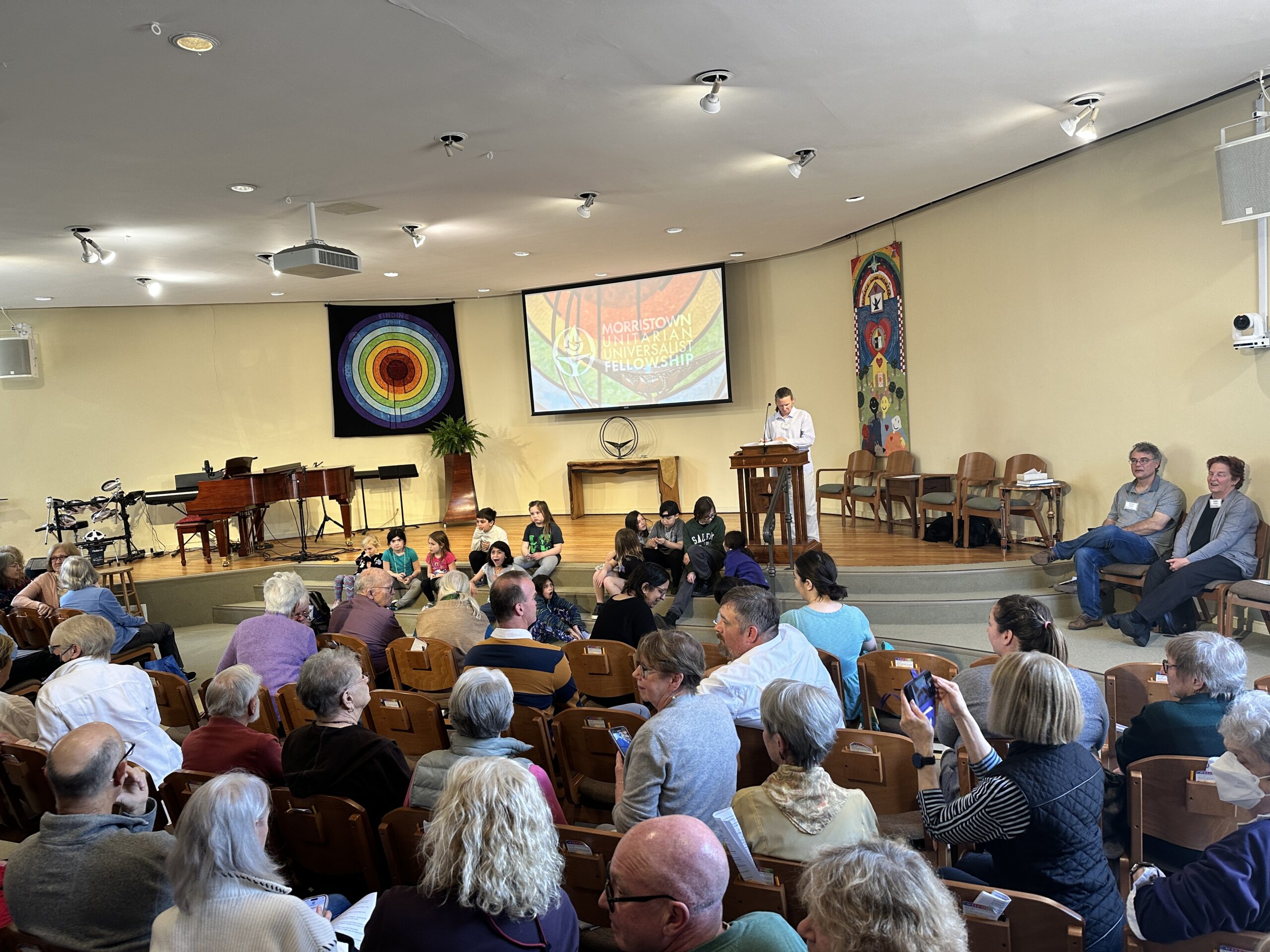 Members of the Fellowship wait for Rev. Sasha after the unanimous vote