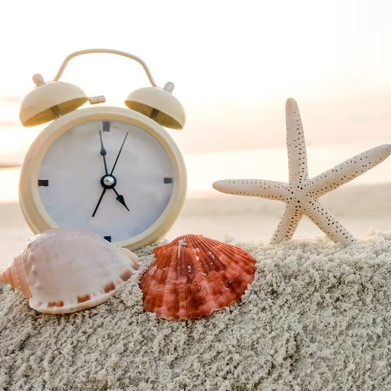 Clock in Sand with Sea Shells